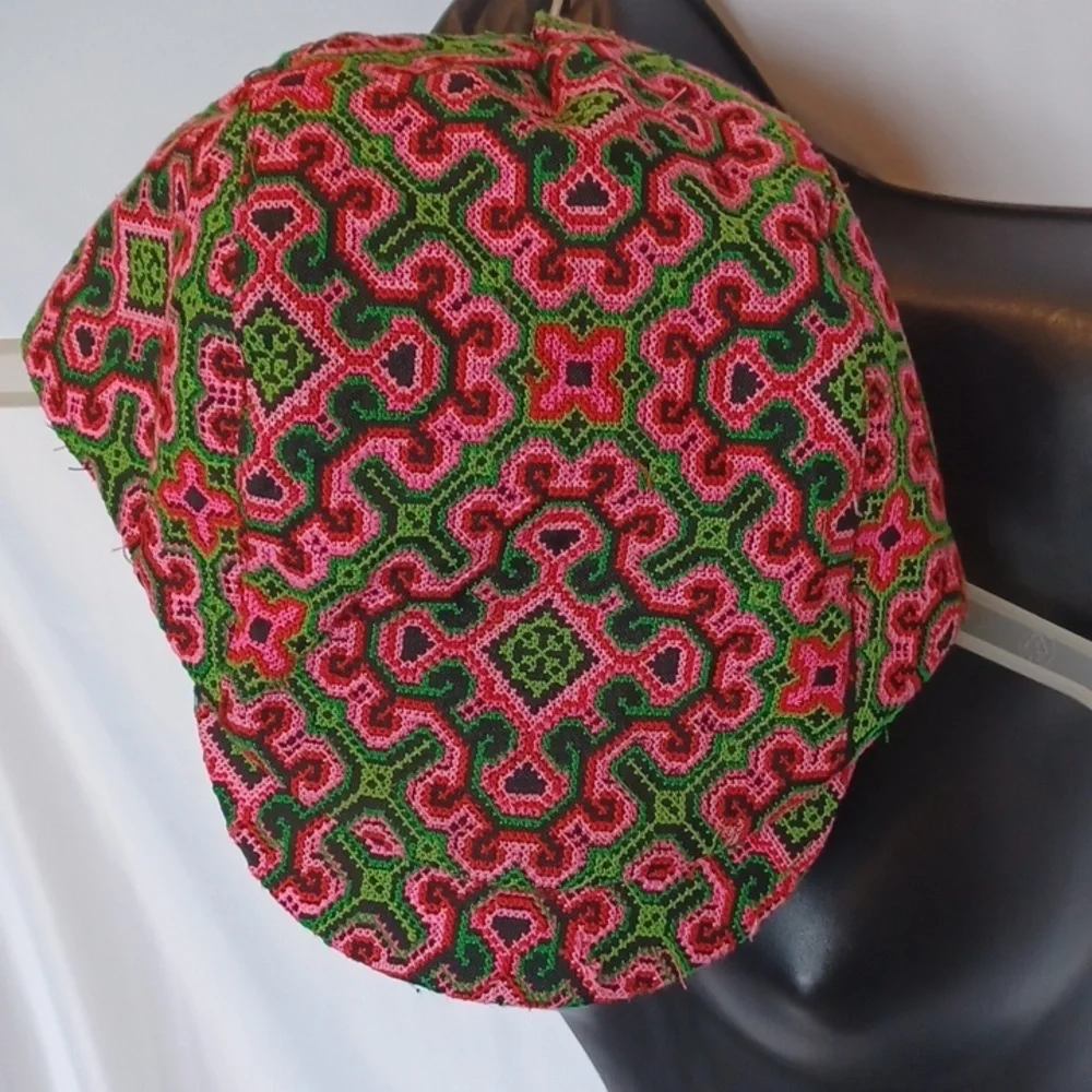 Embroidered ponytail hat.  Hair up, down, or in-between!          Size M/L.